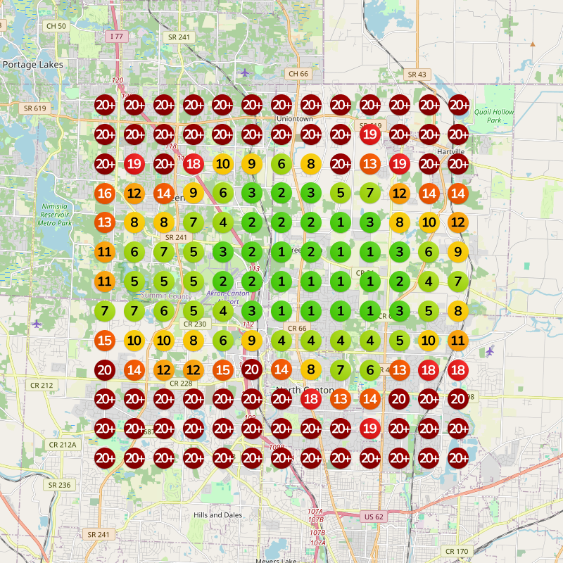 The same auto repair shop after the work: pins turned green and orange, ranking in the top three across much of town.